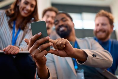 Team using mobile phones in the workplace, Mobile Signal Problem For Businesses